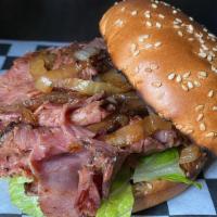 Pastrami Sandwich · Hot Pastrami, served on burger bun, served with your choice of topping and dressing.