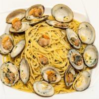 Spaghetti Clams · Fresh clams sautéed in garlic white wine and virgin olive oil or our homemade marinara.