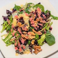 Spring Salad (Side) · Mixed green lettuce, parmesan, cranberries and walnuts.