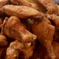 Boneless Wings · Chicken pieces breaded and fried tossed in a choice of wing sauce
