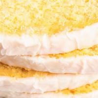 Lemon Pound Cake · A nice thick slice of delicious lemon pound cake with vanilla / lemon icing.