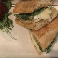 Left Coast - Real Roasted Turkey Breast With Thick Slices Of Triple Cream Brie, Arugula And Fig Jam · Real Roasted Turkey Breast with thick slices of triple cream brie, arugula and fig Jam. West...