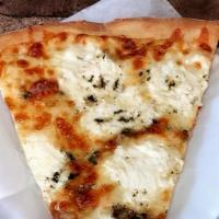 Pizza Bianca · Fresh ricotta, mozzarella, and our homemade garlic-olive oil blend