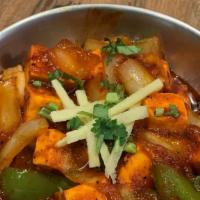 Chili Paneer · Fried cottage cheese stir fried with pepper, onion, chilies and special herbs.