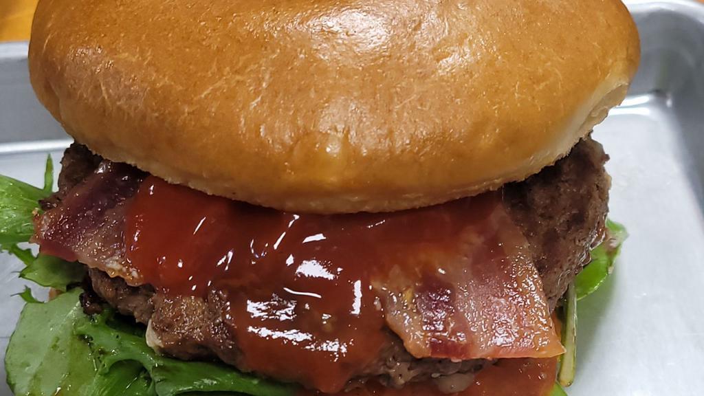 Classic Blt Burger   · Premium short rib burger topped with bacon, lettuce, tomato, b&b pickle, ketchup, and house sauce.