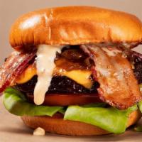 Bacon Cheeseburger  · Premium short rib burger with American Cheese, Bacon, Caramelized onions Lettuce and tomato,...