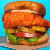 Buffalo Chicken Sandwich  · Fried chicken sandwich tossed in our signature homemade buffalo sauce served with lettuce, t...