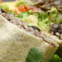Veg Burrito · A Giant Flour Tortilla Filled With Black Or Pinto Beans, Lime & Cilantro Or Brown Rice, ...
