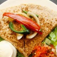 Quesadilla · A Giant Flour Tortilla Filled With Cheese, Sour Cream, Salsa And One Choice Of Marinated Gri...