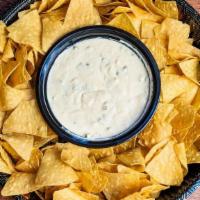 Nacho Tray & Queso (Up To 10 Servings) · A Heaping Pile Of Corn Tortilla Chips Topped With, Queso, Cheese, Sour Cream, Salsa And One ...