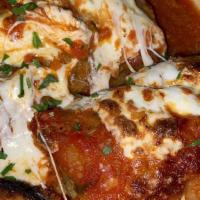 Eggplant Rollatini · Breaded or grilled eggplant, stuffed seasoned ricotta cheese, topped with melted mozzarella ...