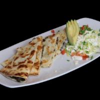 Quesadillas  · Flour Tortilla 
Meats: Grilled Steak, Seasoned, Sausage, Chicken or Pastor , Pork, Mexican S...