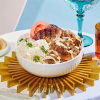 Chicken Shawarma Bowl · Marinated chicken breast over rice with hummus, tomatoes, grilled onions, and drizzled with ...