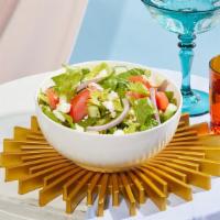 Mediterranean Salad · Mixed greens with tomatoes, onions, cucumbers, feta, and an herb vinaigrette.