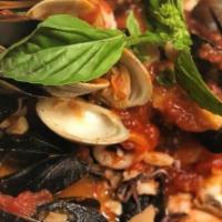 Angry Mussels · Spicy. Freshly caught mussels, bread crumbs, and hot peppers in a spicy marinara sauce.