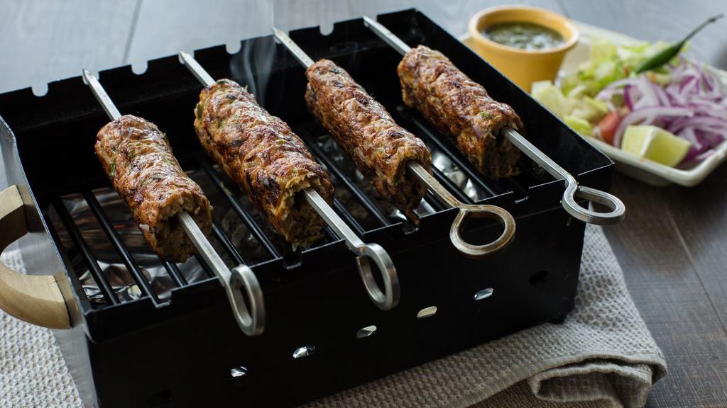 Chicken Reshmi Seekh Kabab · Minced chicken kababs grilled on skewers.