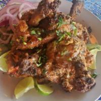 Chicken Chop · Tandoor Grilled Chicken Lollipops made with chef's special Marinade