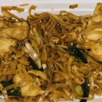 Pad Thai · Spicy. Stir fried thai noodles with egg, bean sprouts, dry tofu and topped with ground peanu...