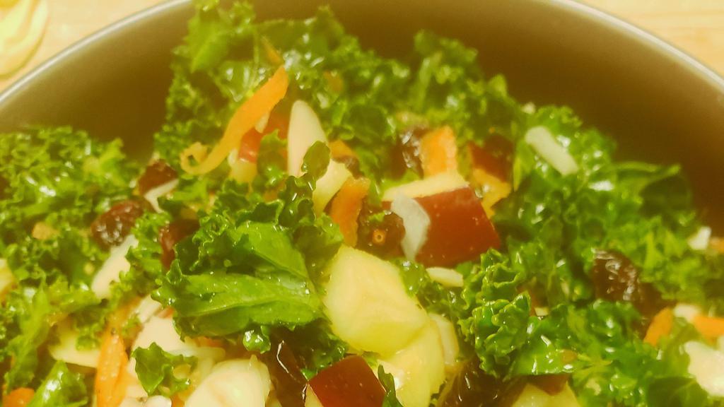 Calypso Kale Salad · Vegan. Apples, Sliced Almonds, Carrots, Dried Cranberries, Scotch Bonnet Vinaigrette.