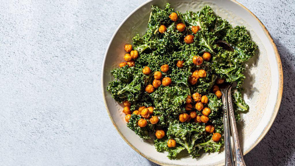 Kale Caesar Salad · Kale, cherry tomatoes, shaved reggiano, croutons and caesar dressing.
