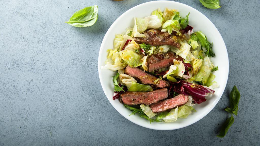 Marinated Steak Salad · Arugula, red onions, mushrooms and balsamic vinaigrette.