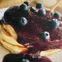 Blueberry Pancake · blueberry with berries compote, powdered sugar
