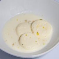 Ras Malai · Steamed cottage cheese dumpling with flavored soffron milk.