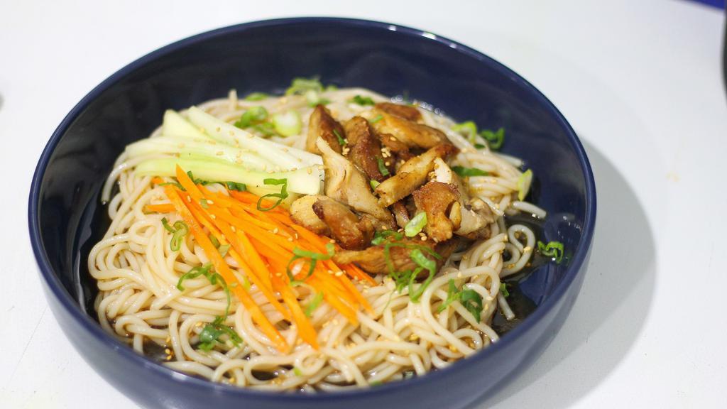 Refreshing Soy Ginger Cold Noodle · Choice of protein, thick rice noodles, soy ginger sauce, garlic, sesame & scallion infused oil, thin-sliced cucumbers and carrots. Light and refreshing for hot days!