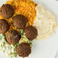 Falafel Platter · Arabic spiced ground chickpeas formed into balls with a side of rice or fries, hummus, tahin...