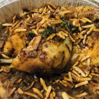Musakhan Platter · Roasted half chicken baked with onions, olive oil, sumac, allspice, saffron and fried almond...