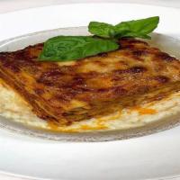 Lasagne All'Emiliana · Traditional lasagna, Bolognese beef ragu', béchamel, parmigiano cheese