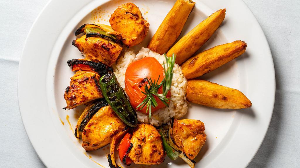 Chicken Shish · Tender chunks of chicken, marinated with chef sown blend of herbs and spices and served with rice.