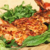Chicken Chops · Char-grilled tender pieces of chicken tie make like chops