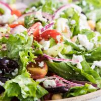 Mediterranean Salad · Lettuce, carrots, red cabbage, cucumber, tomatoes with feta cheese.