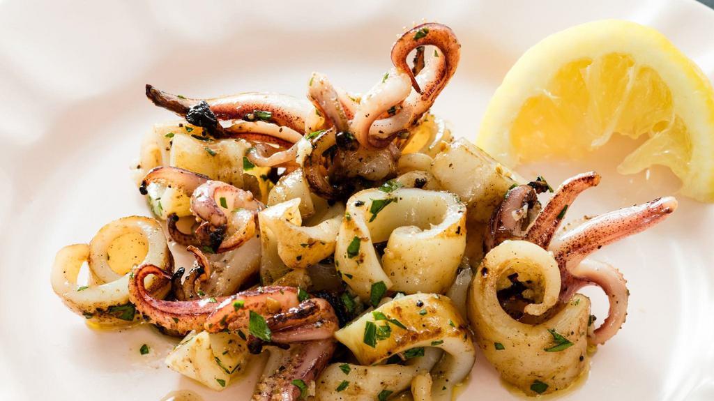Grilled Calamari · Tender grilled calamari sauteed with tarragon, garlic and butter sauce served with our special sauce.