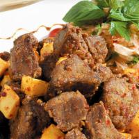 Fried Calf'S Liver · Pan fried calf sliver cubes and potatoes with shallots and oregano.