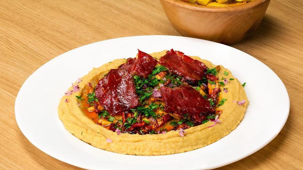 Pastirmali  Hummus · Turkish beef pastrami mix with Hummus   service hot