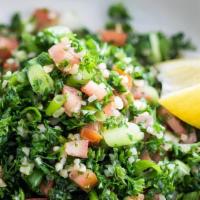 Tabbouleh · Wheat croutons, with parsley, scallions and a touch of olive oil and lemon juice.