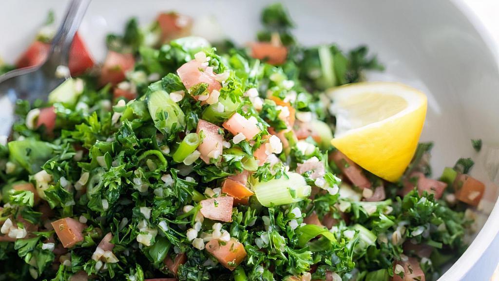 Tabbouleh · Wheat croutons, with parsley, scallions and a touch of olive oil and lemon juice.