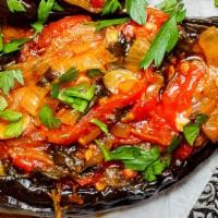 Stuffed Eggplant (Imam Bayildi ) · Whole baby eggplant stuffed with sauteed tomatoes, onions, pine nuts, and herbs cooked with ...