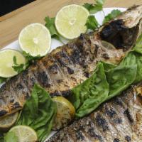 Grill Whole Brazino /  Grill  Sea Bass · Whole grilled Mediterranean sea bass served with arugula salad.