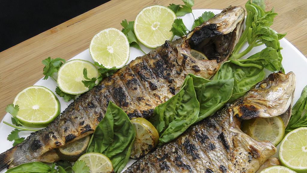 Grill Whole Brazino /  Grill  Sea Bass · Whole grilled Mediterranean sea bass served with arugula salad.