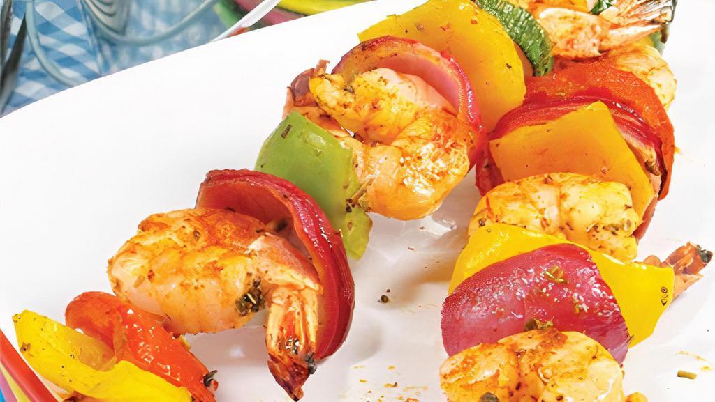 Shrimp Shish · Char-grilled shrimp in our chefs delightfully light sauce served with arugula salad.