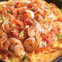 Shrimp Casserole · Shrimp sauteed with onions, garlic, peppers and tomatoes topped with kashari cheese served w...