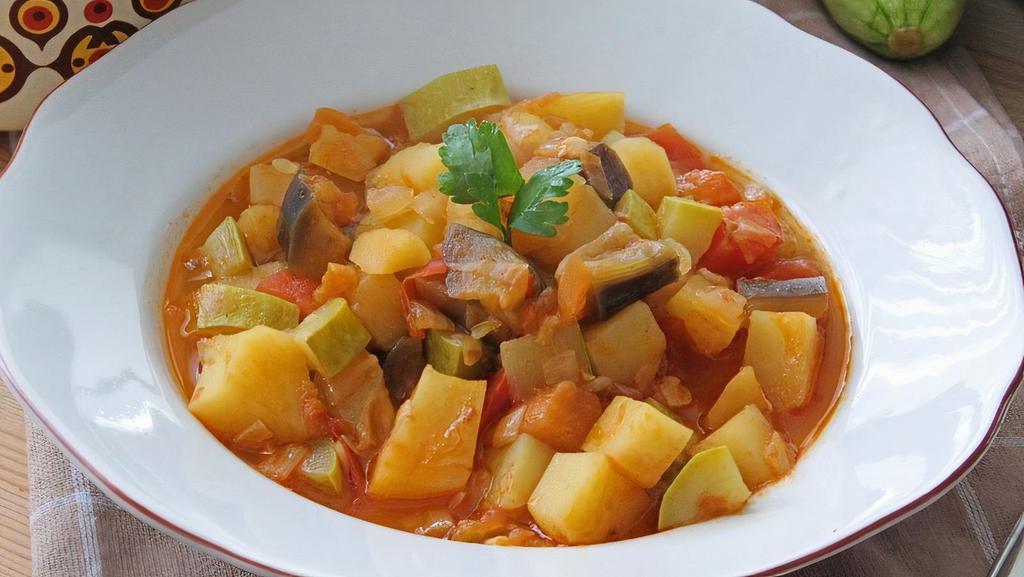 Sautéed Mix Vegetable · Homemade  A fine mixture of potatoes, carrots, zucchini, eggplant, white onions, red green pepper and garlic sauteed with our light tomato sauce served with rice.