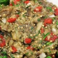 Caucasus Eggplant Salad · Prepared with baked eggplants, roasted red peppers, garlic and cilantro. per 1/2 Lb