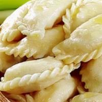 Homemade Meet Pierogies · (6 pcs) Dumplings made with fillings, such as boiled ground meat and fried onions. Served wi...