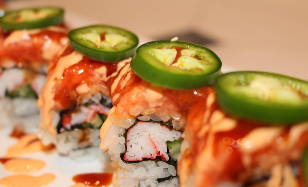 Super Fire Roll · Spicy crab topped with spicy tuna, special spicy sauce, and jalapeno.