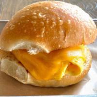 Egg & Cheese Roll · Fried Egg, Cheddar (Gluten-Free Possible)