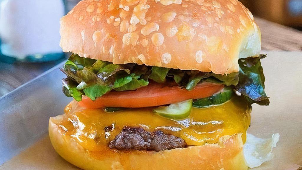 Cheese Burger · Grass-fed beef custom blend, cheese, lettuce, pickles,  Tomato, GRK sauce (Gluten-Free Possible)